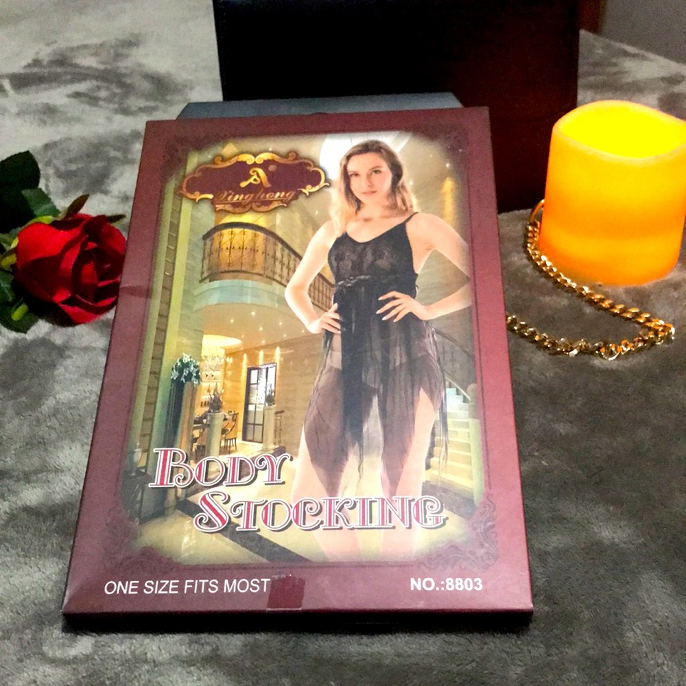 Sexy lingerie! Red body stocking with skirt flare. Nylon and spandex, one size.